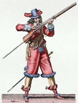 Musketeer of the Infantry of Louis XIV blowing the fuse of t Musketeer of the Infantry of Louis XIV blowing the fuse of t