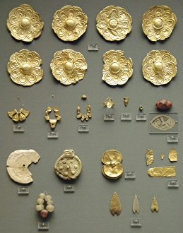 Mycenaean art. Set of gold pieces among which eight rosettes Mycenaean art. Set of gold pieces among which eight rosettes