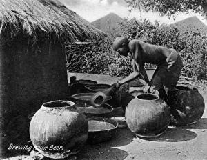 Native African Matabele man brewing beer Native African Matabele man brewing beer