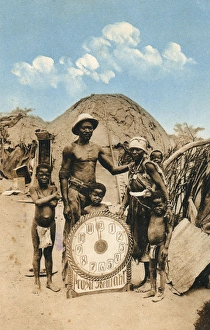 Natives with clock, Swakopmund, south west Africa Natives with clock, Swakopmund, south west Africa