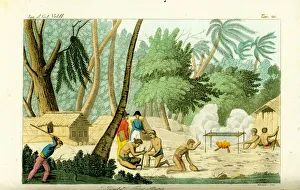 Natives grilling fish on Rawak Island near Natives grilling fish on Rawak Island near