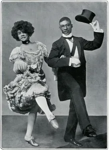 Prints of Miss Ada Overton Walker and Mr George Walker, performing The Tsar of Dixie a song in the play In Dahomey at the Shaftesbury Theatre in 1903 Theatre Prints: George Walker and Ada Overton Walker in In Dahomey, 1903 Print