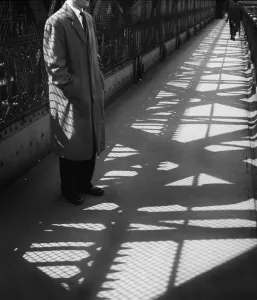 Surrealism Prints: Man Standing on Bridge Print, circa 1950s
