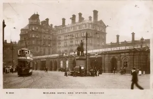 Prints of Midland Hotel and Railway Station Station - Forster Square, Bradford, West Yorkshire. The statue (centre) is of Richard Oastler, who fought against the use of child labour in the mills. Date: 1912 Bradford Prints: Midland Hotel and Railway Station Print, Bradford, 1912