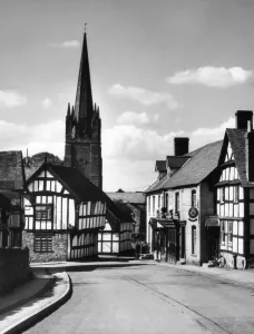 Prints of Weobley, a beautiful Herefordshire market town of old half-timbered houses, mellowed by age and clustering round an imposing 14th century church. Date: 1950s Herefordshire Prints: Weobley, Herefordshire: Half-Timbered Houses Print 1950s