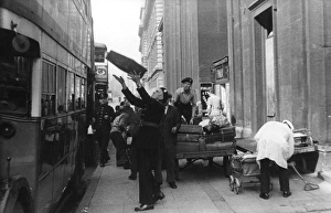 NFS personnel unloading luggage, St Pancras, WW2 NFS personnel unloading luggage, St Pancras, WW2