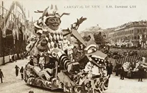 Prints of Nice Carnival, France - a decorated float depicting a clown riding a dragon Nice Prints: Nice Carnival Print - Clown Riding a Dragon Float, France