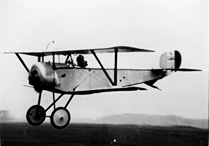 Nieuport 11 Bebe in low-level flight Nieuport 11 Bebe in low-level flight