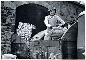 Norah Blaney working on a dust-cart in WWII Norah Blaney working on a dust-cart in WWII