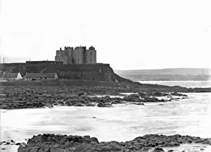 Prints of O Haras Castle, Portstewart viewed over water and rocks. (Location: Northern Ireland; County Antrim; Portstewart). Date: circa early 1900s Monuments And Landmark Prints: Early 20th Century Print of O Haras Castle, Portstewart
