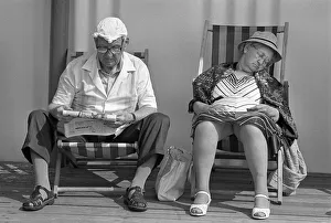 Old couple in deck chairs, Great Yarmouth, England Old couple in deck chairs, Great Yarmouth, England