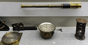 Old navigational instruments. Vintage telescope, compass, ho Old navigational instruments. Vintage telescope, compass, ho