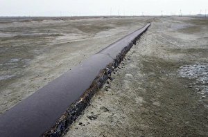 An old rusty pipe-line - carrying extracted iodine An old rusty pipe-line - carrying extracted iodine