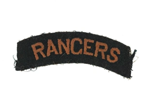 One of a pair of embroidered shoulder titles One of a pair of embroidered shoulder titles