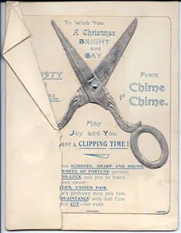 Pair of scissors with comic verse on a Christmas card Pair of scissors with comic verse on a Christmas card