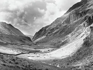 Prints of A striking view of the Pass of Llanberis, Caernarvonshire, which traverses a valley of exceptional wildness, between Snowdon and the Glyder Mountains Gwynedd Prints: Print of the Pass of Llanberis landscape