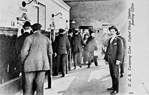 Passengers at Oxford Circus tube station, Central London Passengers at Oxford Circus tube station, Central London