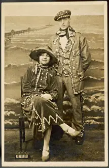 Prints of A Pearl King and Queen with a seaside studio backdrop behind them Art Prints: Vintage Print of Pearly King and Queen