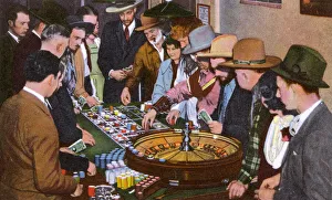 People with roulette wheel, Nevada, USA People with roulette wheel, Nevada, USA
