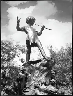 Prints of The Peter Pan monument was erected on 1 May 1912 in Kensington Gardens and sculpted by George Frampton. Peter Pan entered London along the Serpentine in the story Kensington Gardens Prints: Peter Pan Print, Kensington Gardens Statue