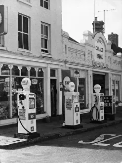 Petrol pumps on the pavement at a service station at Ellesmere, Shropshire, England Petrol pumps on the pavement at a service station at Ellesmere, Shropshire, England
