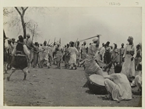 Photograph of Sudanese preparing for battle Photograph of Sudanese preparing for battle