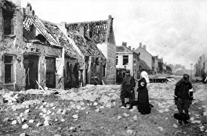 Photographed during the fierce German bombardment of the town: A ruined street in Nieuport Photographed during the fierce German bombardment of the town: A ruined street in Nieuport