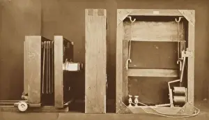Old Camera Technology Prints: A photographing camera and back of electro-shutter