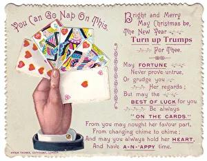 Playing cards with comic verse on a Christmas card Playing cards with comic verse on a Christmas card