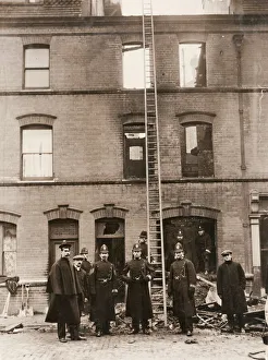 Policemen guarding house in Sidney Street, East London Policemen guarding house in Sidney Street, East London