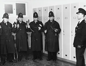 Policemen in station parade room, London Policemen in station parade room, London