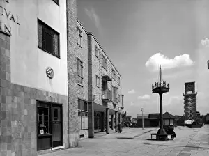 Prints of Poplar tidied up for the Festival of Britain : shops and the Festival Inn. Date: 1952 Poplar Prints: Poplar Tidied Up Print, 1952