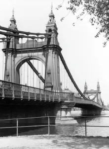 Prints of Hammersmith Bridge, west London, was the first suspension bridge over the River Thames. It was designed by noted civil engineer Sir Joseph Bazalgette. Date: completed 1887 River Thames Prints: Hammersmith Bridge Print, 1887 London