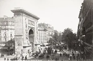 Porte Saint Denis, with busy traffic, Paris France Porte Saint Denis, with busy traffic, Paris France