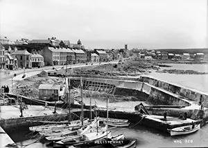 Prints of Portstewart - a panoramic view of the harbour and boats and promenade of Portstewart. (Location: Northern Ireland: County Londonderry: Portstewart). Date: circa early 1900s County Londonderry Prints: Portstewart Panoramic Print, circa early 1900s
