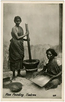 Pounding Rice using large pestle and mortar - Chennai, India Pounding Rice using large pestle and mortar - Chennai, India