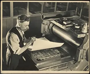 Printer Inspecting Print in a Printing Chase
