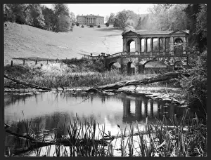 Prints of Prior Park in Bath. In the background is the mansion built for Ralph Allen, in the foreground the Palladian Bridge Palladian Architecture Prints: Prior Park Print: Palladian Bridge and Ralph Allen's Mansion