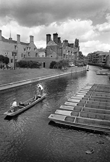 Punting on the River Cam in Cambridge, England Punting on the River Cam in Cambridge, England