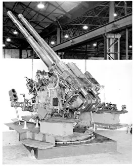 QF 4-inch naval gun Mk XVI on a twin HA/LA mount QF 4-inch naval gun Mk XVI on a twin HA/LA mount