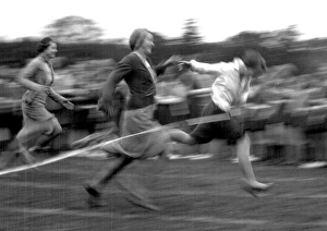 Racing women reach the finishing line Racing women reach the finishing line
