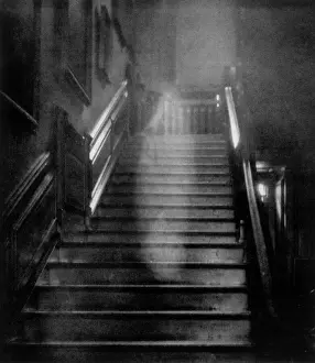 Prints of Raynham Hall, Norfolk; This figure is not seen but is unknowingly photographed on the staircase; it may be the ghost of Dorothy Walpole, known as The Brown Lady. Date: 1936 Related Prints: 1936 Print of The Brown Lady on the Raynham Hall Staircase