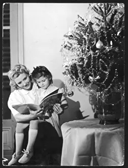 Childhood Christmas Memories Prints: Reading under C mas Tree