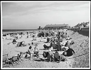 Prints of Lots of deckchairs and families with young children on the beach at Redcar, Cleveland, England Cleveland Prints: Redcar Beach Scene, 1950s Colour Print
