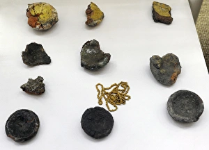 Remains of vitreous mass, clays crucible and pearls. 13th c Remains of vitreous mass, clays crucible and pearls. 13th c