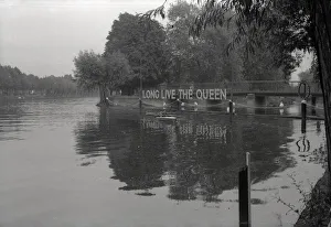 A riverbank decorated with Long Live the Queen - Coronation A riverbank decorated with Long Live the Queen - Coronation