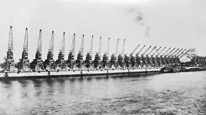 Early 20th Century Industry Photos Prints: Riverside Cranes