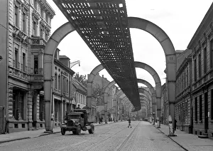 Cobblestone Road Prints: Road with overhead structure