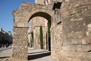 Roman Art. Ruins ot the roman wall and two arches from the a Roman Art. Ruins ot the roman wall and two arches from the a
