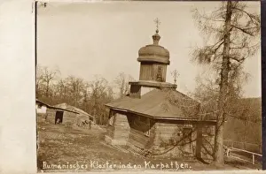 Prints of A beautiful little wooden church set high on the slopes of the Carpathian Mountains in Romania. Date: circa 1910s Romania Prints: Romania - Small Wooden Church Print, circa 1910s